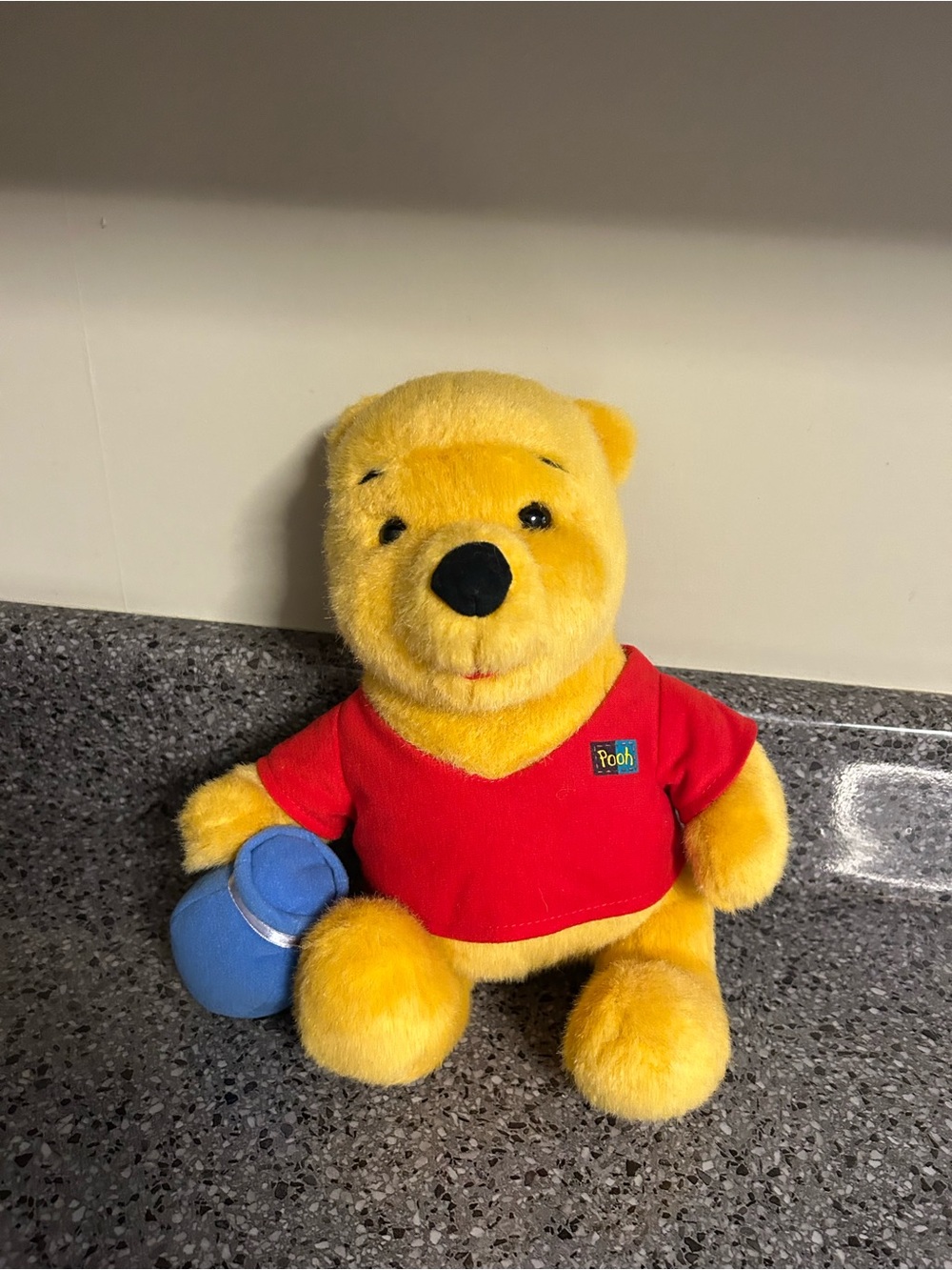 Vintage Mattel 1994 Winnie the Pooh with honey jar.